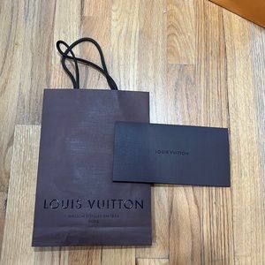 Louis Vuitton gift bag and receipt holder